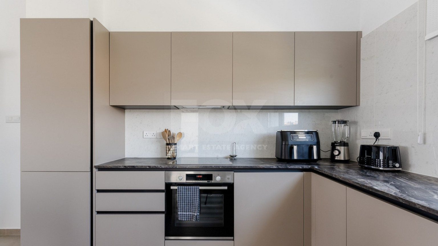 Stunning Two  Bedroom Apartment For Sale In Potamos Germasogeias Near The Sea Front.