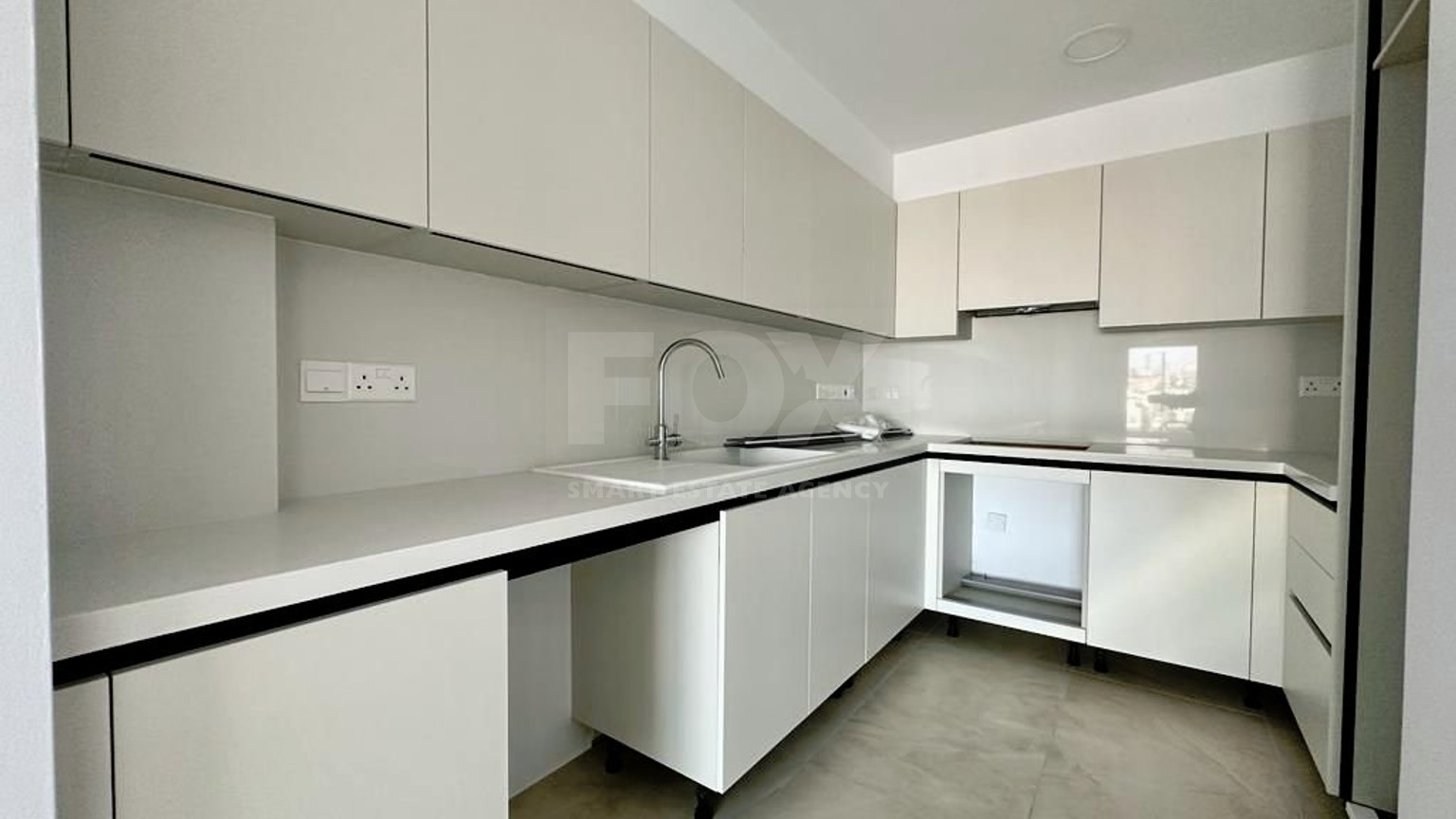 Two Bedroom Ground Floor Apartment with Private Garden and Parking for sale In Agios Athanasios