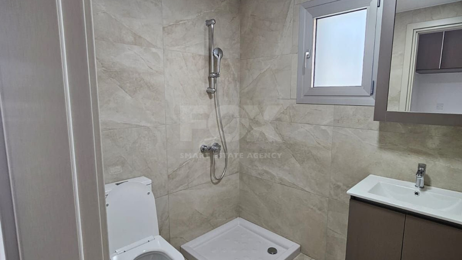 Two Bedroom Ground Floor Apartment with Private Garden and Parking for sale In Agios Athanasios