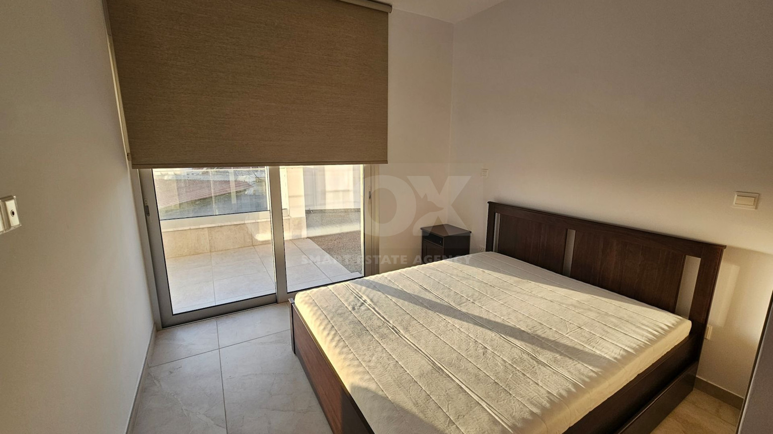 Two Bedroom Ground Floor Apartment with Private Garden and Parking for sale In Agios Athanasios
