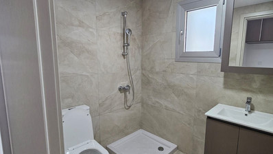Two Bedroom Ground Floor Apartment with Private Garden and Parking for sale In Agios Athanasios