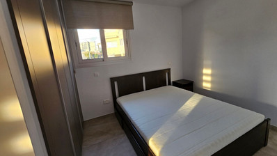 Two Bedroom Ground Floor Apartment with Private Garden and Parking for sale In Agios Athanasios