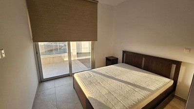 Two Bedroom Ground Floor Apartment with Private Garden and Parking for sale In Agios Athanasios