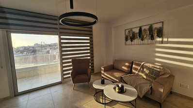 Two Bedroom Ground Floor Apartment with Private Garden and Parking for sale In Agios Athanasios