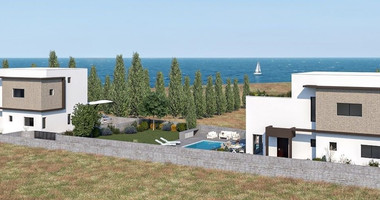 Seafront 4- bedroom villa ,just 100m from the beach, in Pomos Village