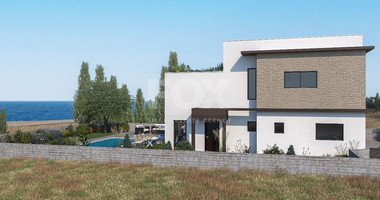 Seafront 4- bedroom villa ,just 100m from the beach, in Pomos Village