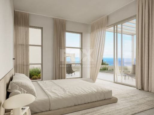 Three bedroom villa with sea view in Peyia village .