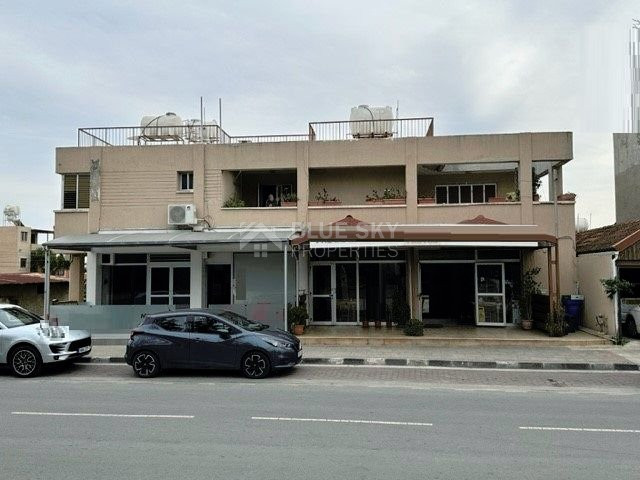 BUILDING ON BUSY ROAD WITH 2 SHOPS -LARGE UPPER PENTHOUSE- BASEMENT