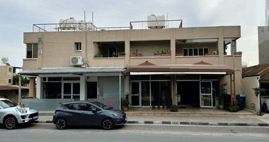 BUILDING ON BUSY ROAD WITH 2 SHOPS -LARGE UPPER PENTHOUSE- BASEMENT