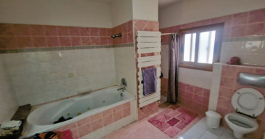 Villa for sale in Agia Paraskevi, Germasogeia: Stunning Views and Basement Apartment