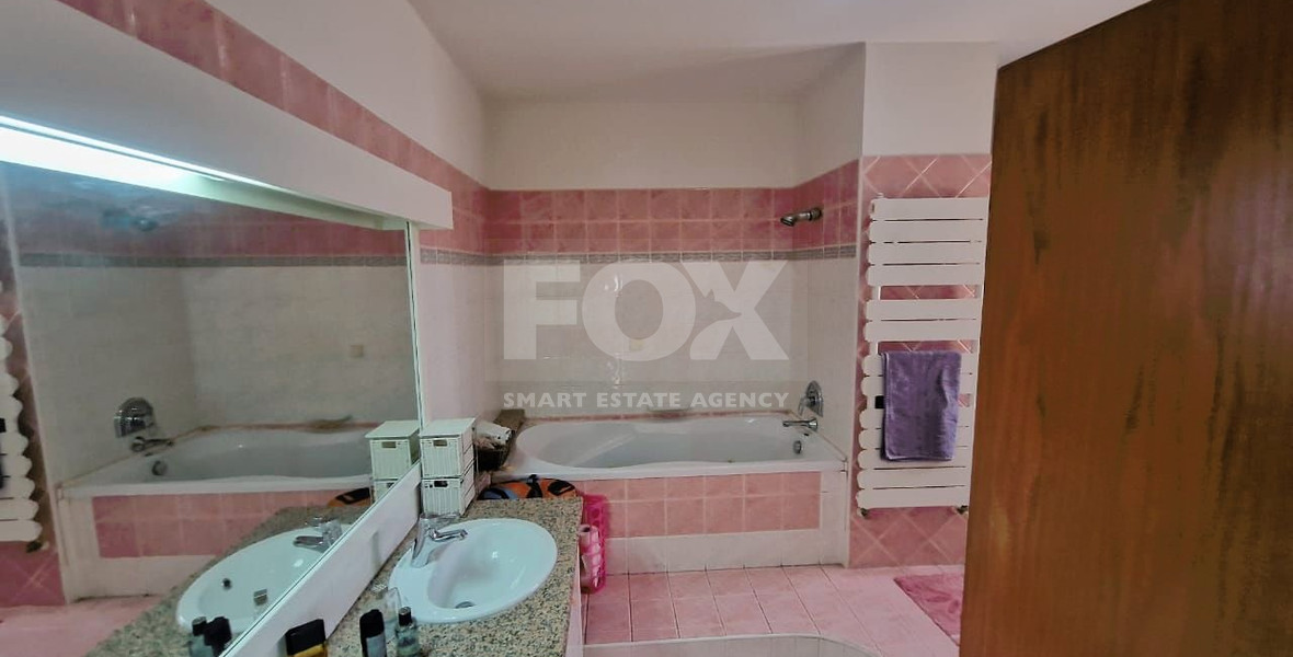 Villa for sale in Agia Paraskevi, Germasogeia: Stunning Views and Basement Apartment