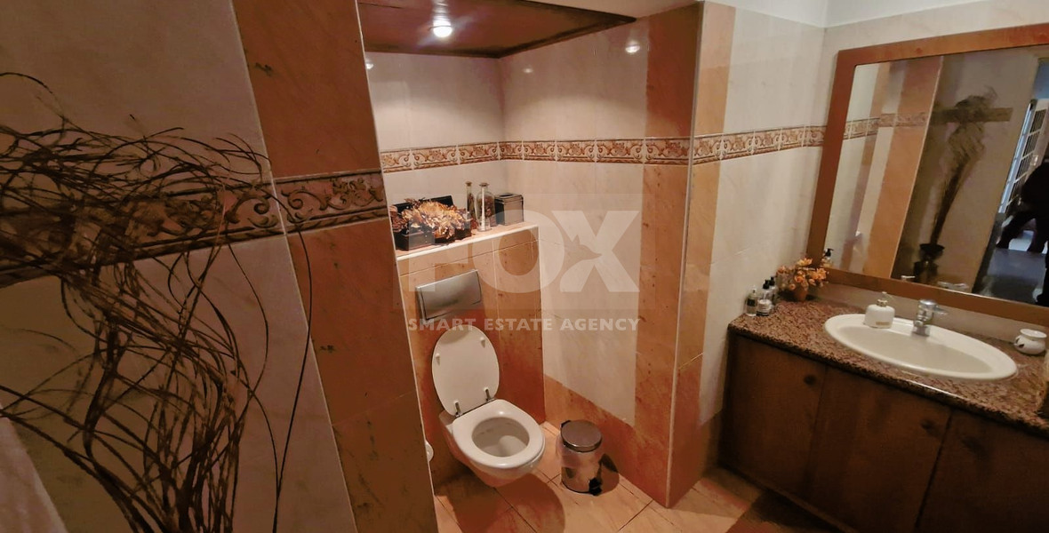 Villa for sale in Agia Paraskevi, Germasogeia: Stunning Views and Basement Apartment