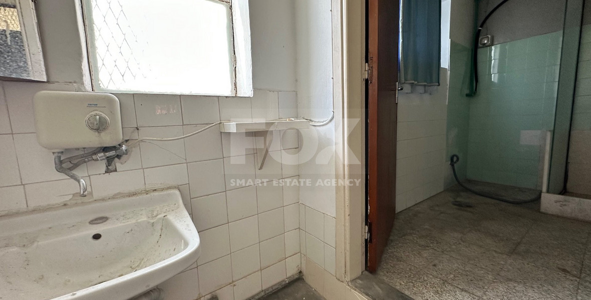 PLOT WITH TWO STOREY BUILDING ON IN THE HEART OF AGIA ZONI