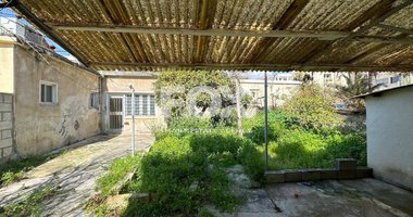 PLOT WITH TWO STOREY BUILDING ON IN THE HEART OF AGIA ZONI
