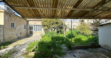 PLOT WITH TWO STOREY BUILDING ON IN THE HEART OF AGIA ZONI