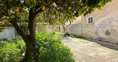 PLOT WITH TWO STOREY BUILDING ON IN THE HEART OF AGIA ZONI