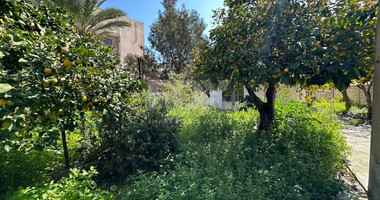 PLOT WITH TWO STOREY BUILDING ON IN THE HEART OF AGIA ZONI