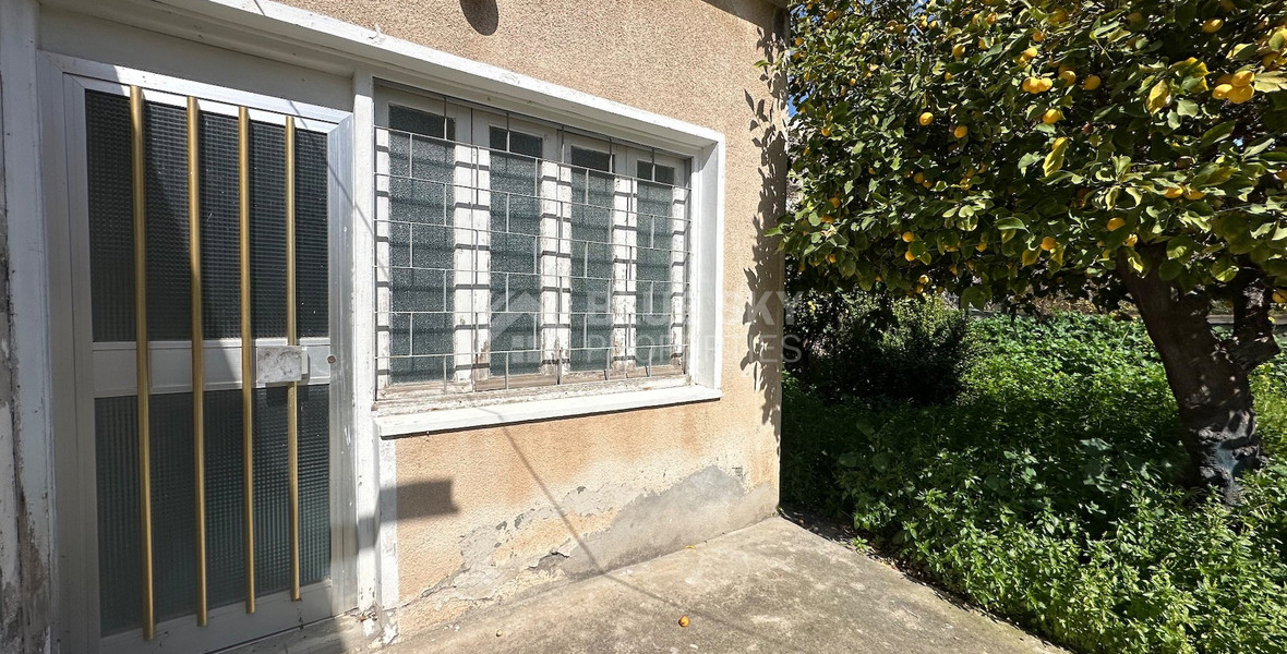 PLOT WITH TWO STOREY BUILDING ON IN THE HEART OF AGIA ZONI