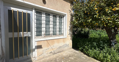 PLOT WITH TWO STOREY BUILDING ON IN THE HEART OF AGIA ZONI