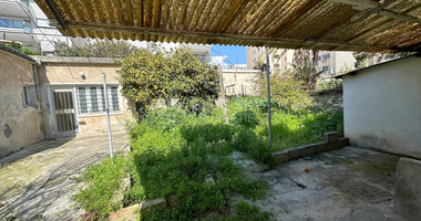 PLOT WITH TWO STOREY BUILDING ON IN THE HEART OF AGIA ZONI