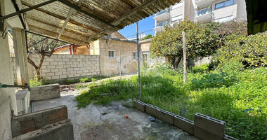 PLOT WITH TWO STOREY BUILDING ON IN THE HEART OF AGIA ZONI