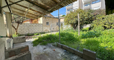 PLOT WITH TWO STOREY BUILDING ON IN THE HEART OF AGIA ZONI