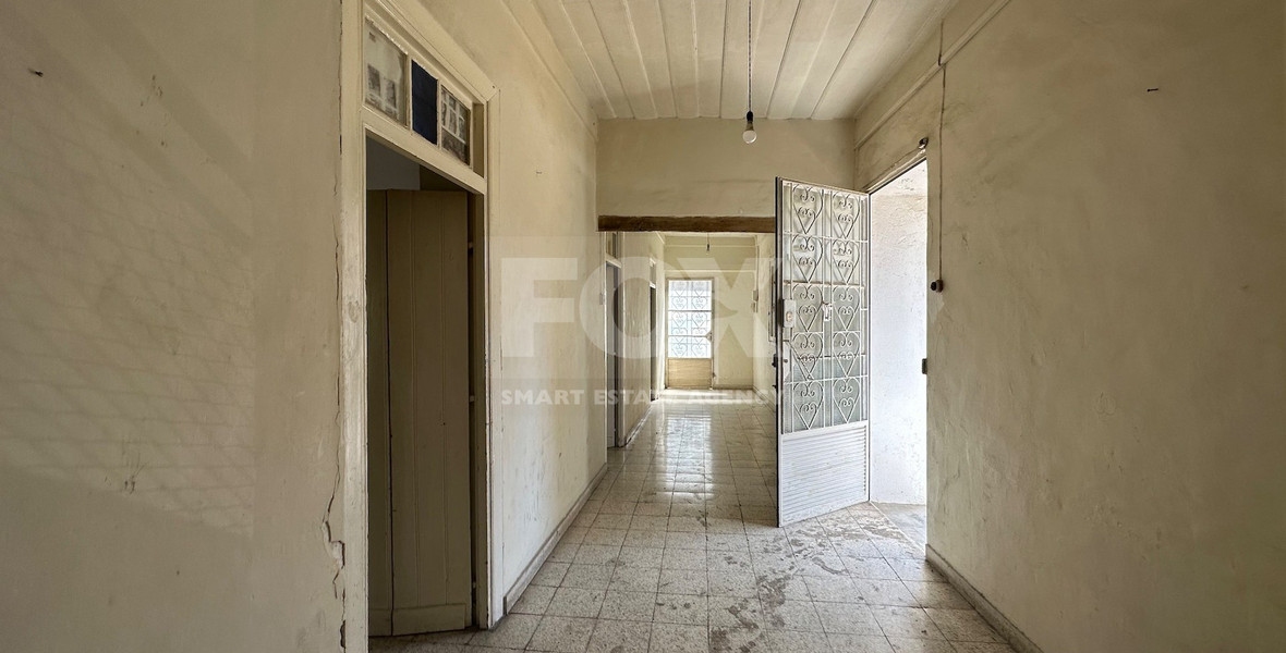 PLOT WITH TWO STOREY BUILDING ON IN THE HEART OF AGIA ZONI