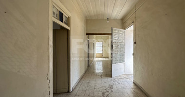 PLOT WITH TWO STOREY BUILDING ON IN THE HEART OF AGIA ZONI