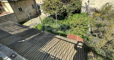 PLOT WITH TWO STOREY BUILDING ON IN THE HEART OF AGIA ZONI