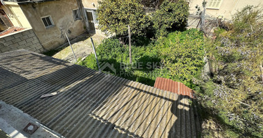 PLOT WITH TWO STOREY BUILDING ON IN THE HEART OF AGIA ZONI