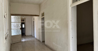 PLOT WITH TWO STOREY BUILDING ON IN THE HEART OF AGIA ZONI