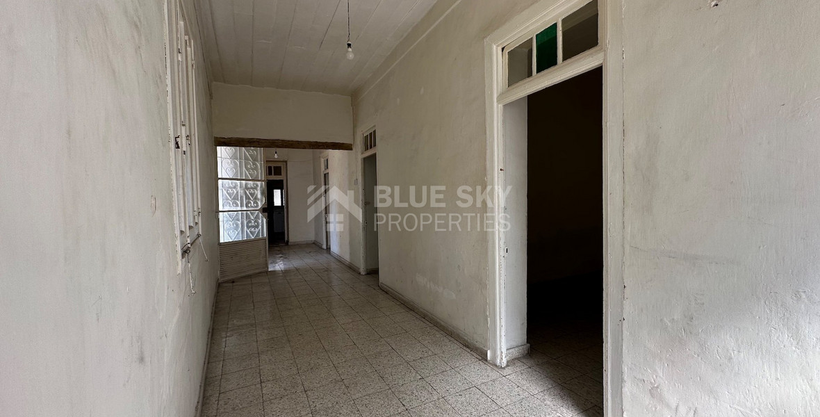 PLOT WITH TWO STOREY BUILDING ON IN THE HEART OF AGIA ZONI