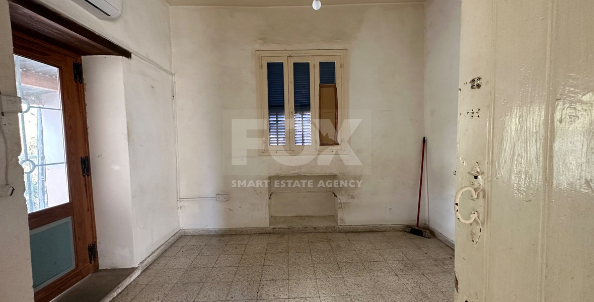 PLOT WITH TWO STOREY BUILDING ON IN THE HEART OF AGIA ZONI