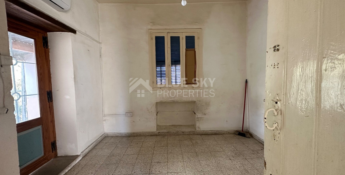 PLOT WITH TWO STOREY BUILDING ON IN THE HEART OF AGIA ZONI