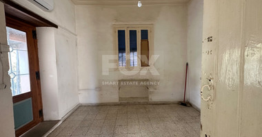 PLOT WITH TWO STOREY BUILDING ON IN THE HEART OF AGIA ZONI