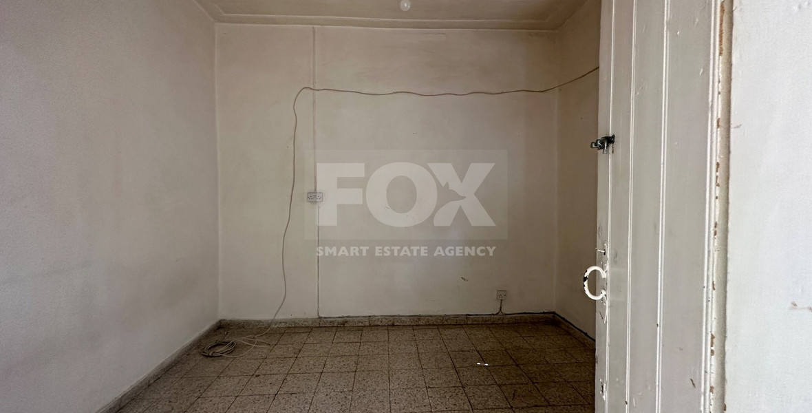 PLOT WITH TWO STOREY BUILDING ON IN THE HEART OF AGIA ZONI