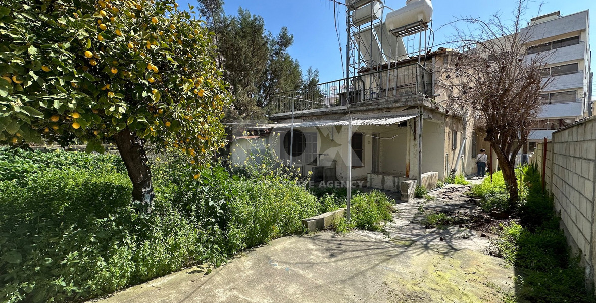 PLOT WITH TWO STOREY BUILDING ON IN THE HEART OF AGIA ZONI