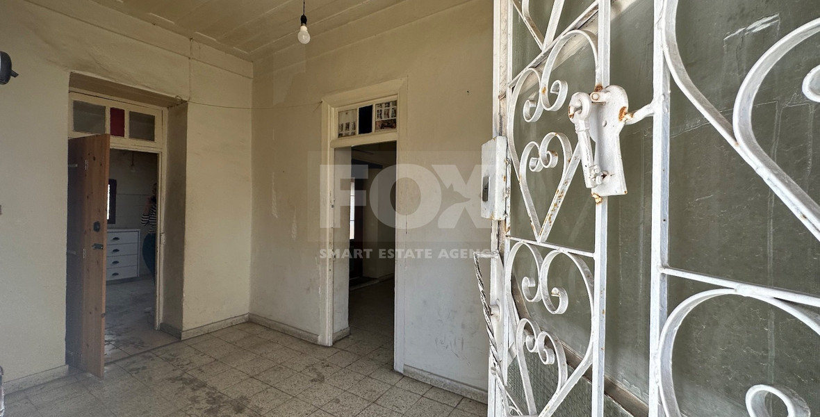 PLOT WITH TWO STOREY BUILDING ON IN THE HEART OF AGIA ZONI