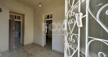 PLOT WITH TWO STOREY BUILDING ON IN THE HEART OF AGIA ZONI