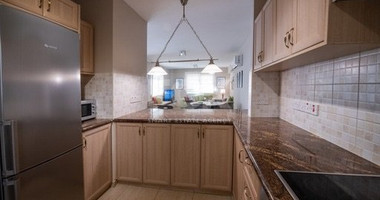 Penthouse across the road from the beach in private complex