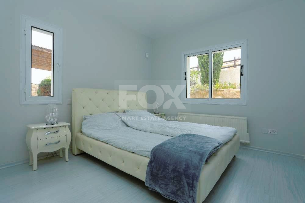 Architect-designed bungalow situated in the charming district of Tala, in the city of Paphos.
