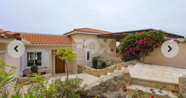 Architect-designed bungalow situated in the charming district of Tala, in the city of Paphos.