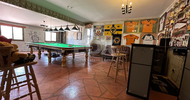 Luxurious Versatile Retreat in the Heart of Prastio offering open views,5 bedrooms, 3 bathrooms.