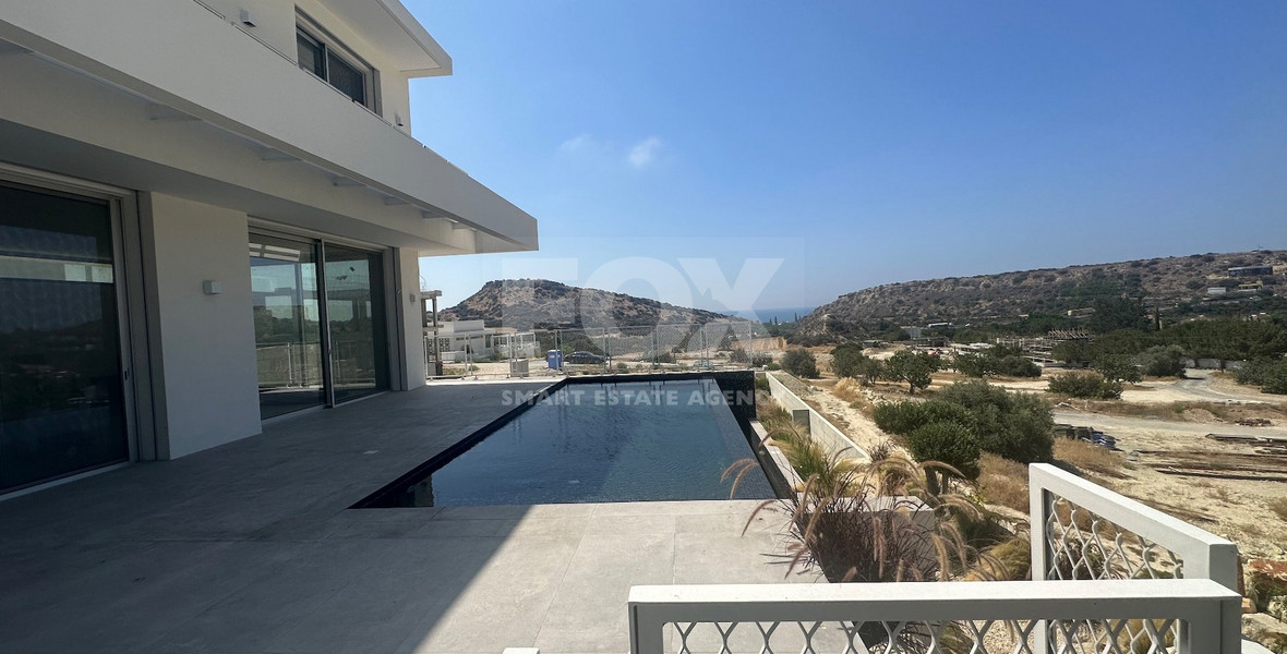 MODERN 6 BEDROOM 5 BATHROOM FURNISHED VILLA IN AN ELEVATED PART OF AGIOS TYCHONAS WITH LOVELY VIEWS