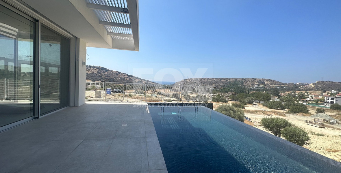 MODERN 6 BEDROOM 5 BATHROOM FURNISHED VILLA IN AN ELEVATED PART OF AGIOS TYCHONAS WITH LOVELY VIEWS