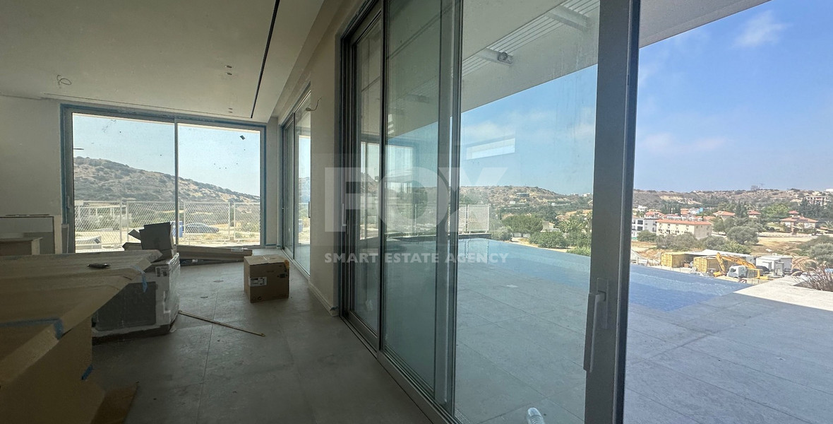 MODERN 6 BEDROOM 5 BATHROOM FURNISHED VILLA IN AN ELEVATED PART OF AGIOS TYCHONAS WITH LOVELY VIEWS