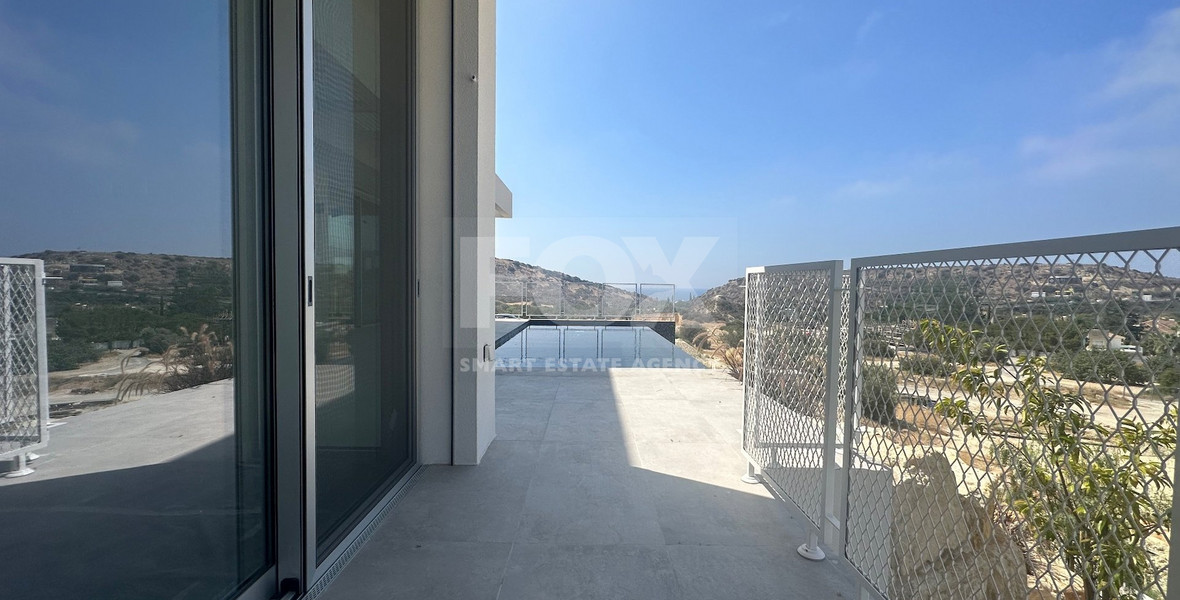 MODERN 6 BEDROOM 5 BATHROOM FURNISHED VILLA IN AN ELEVATED PART OF AGIOS TYCHONAS WITH LOVELY VIEWS