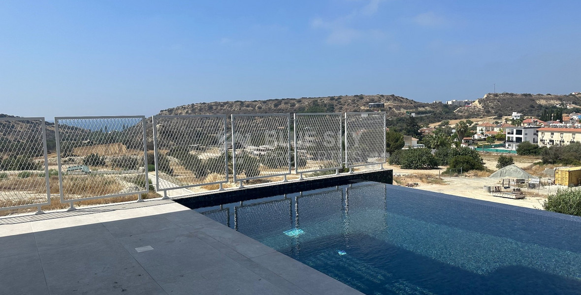 MODERN 6 BEDROOM 5 BATHROOM FURNISHED VILLA IN AN ELEVATED PART OF AGIOS TYCHONAS WITH LOVELY VIEWS