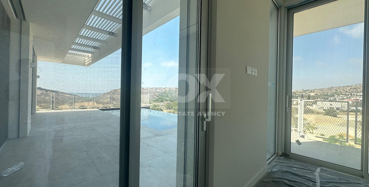 MODERN 6 BEDROOM 5 BATHROOM FURNISHED VILLA IN AN ELEVATED PART OF AGIOS TYCHONAS WITH LOVELY VIEWS