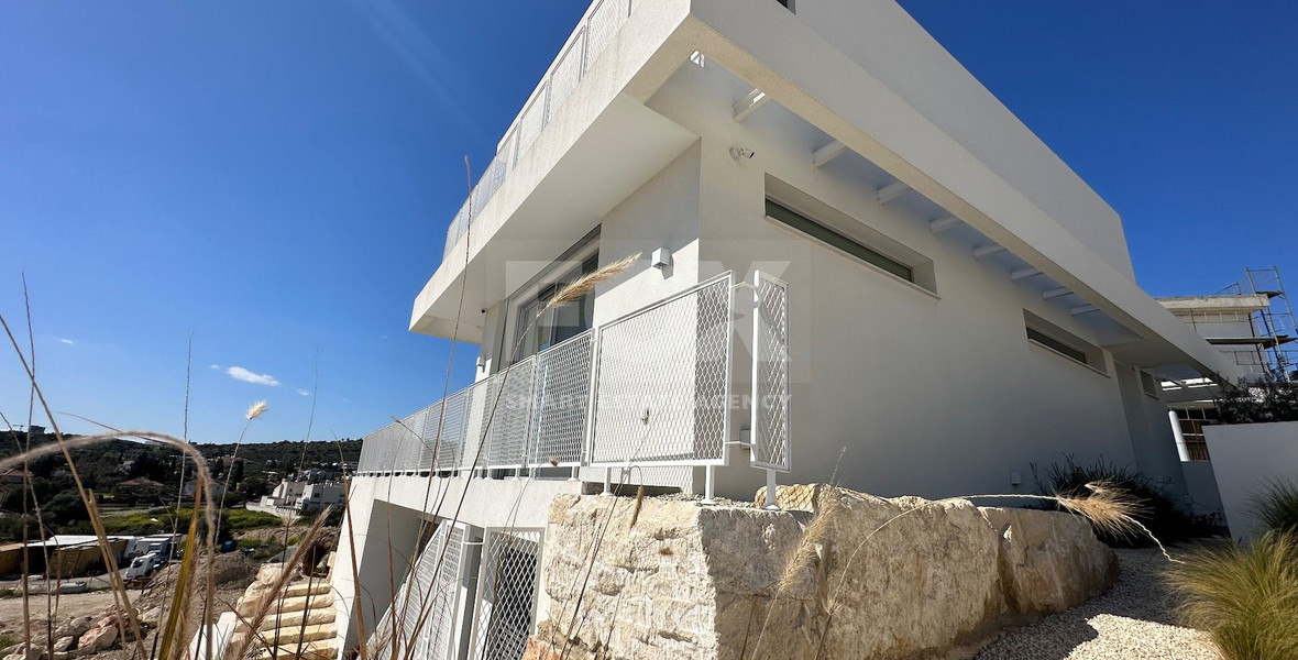 MODERN 6 BEDROOM 5 BATHROOM FURNISHED VILLA IN AN ELEVATED PART OF AGIOS TYCHONAS WITH LOVELY VIEWS